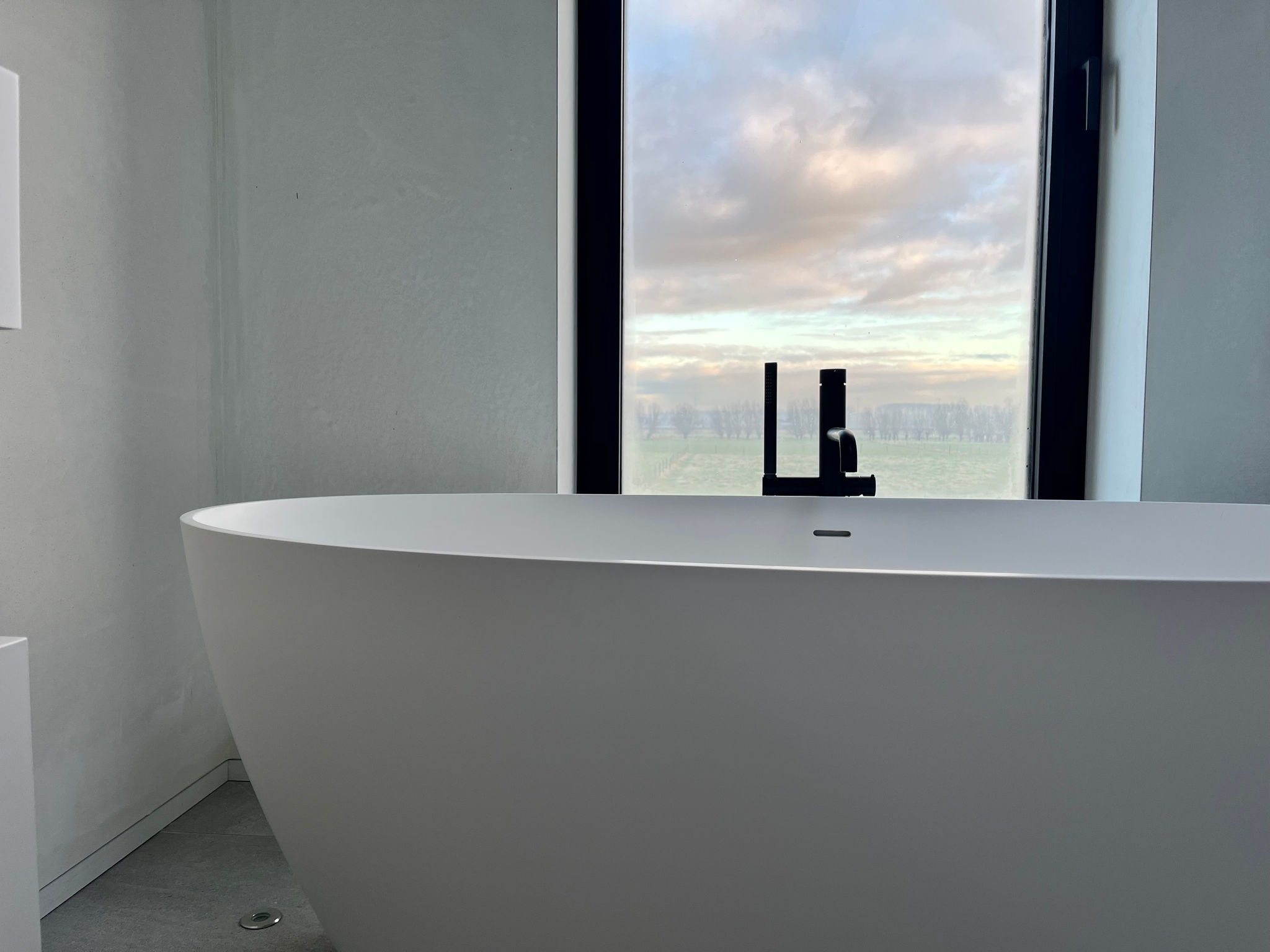 Large bathtub with hot water efficiently heated by a Daikin air-to-water heat pump