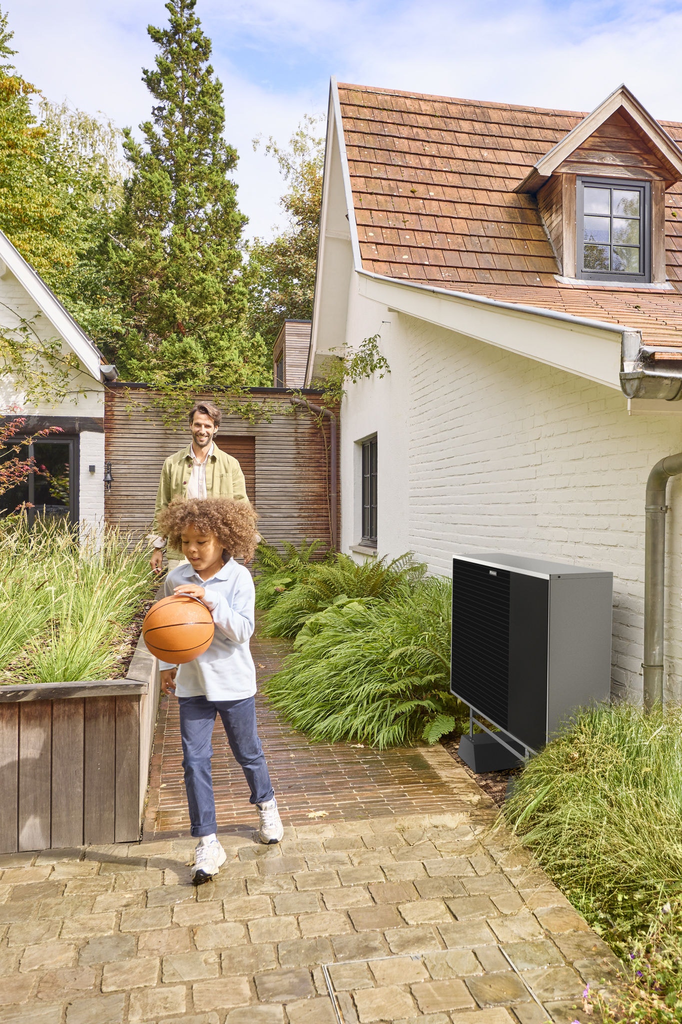 Rodinný dům s tepelným čerpadlem využívajícím vzduch jako zdroj tepla, které zajišťuje účinné vytápění